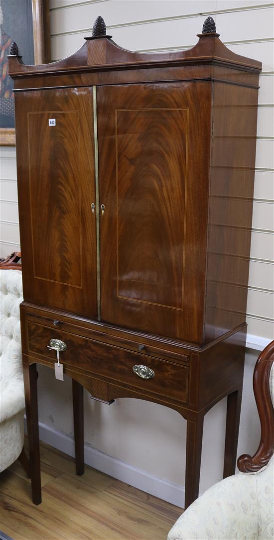 A Regency style mahogany cabinet on stand, W.82cm H.190cm